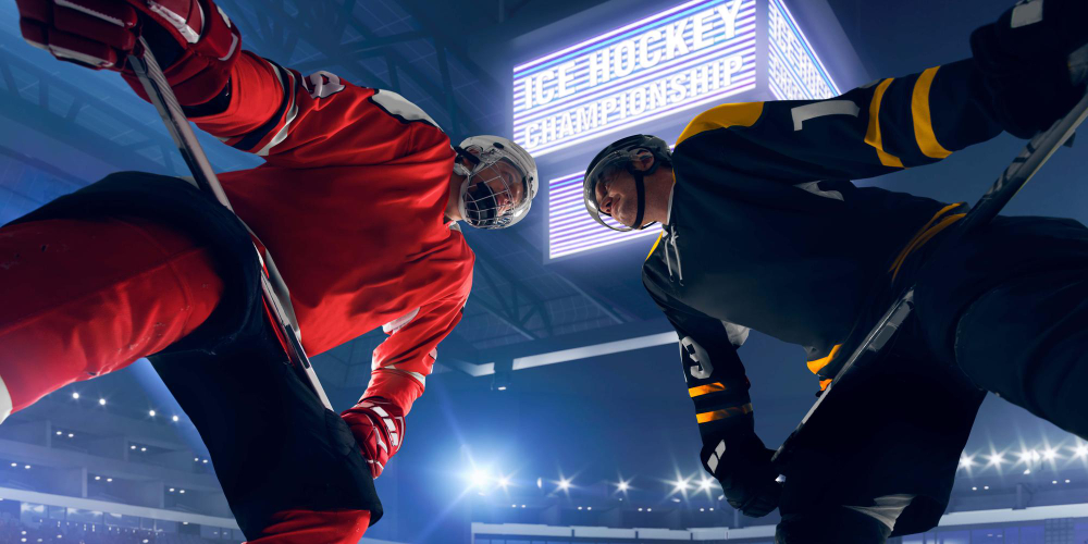 Hockey players staring down before starting their match